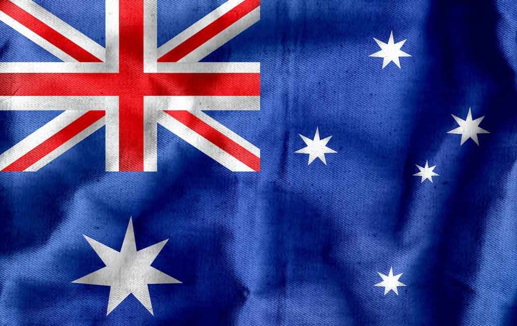 Bandiera australiana: significato, stelle e storia 1 Bandiera australiana con Union Jack, Stella del Commonwealth e Croce del Sud